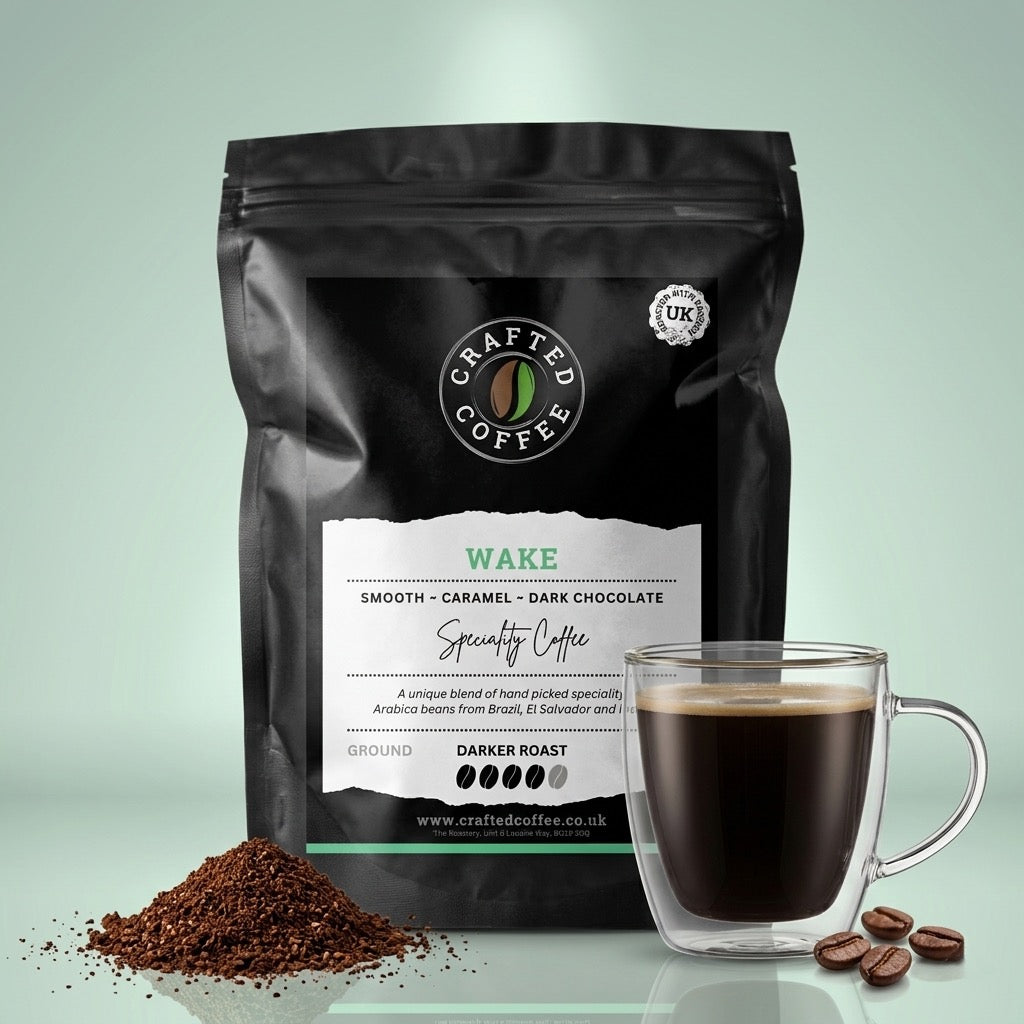 Crafted Coffee bag with a glass of coffee and scattered coffee beans